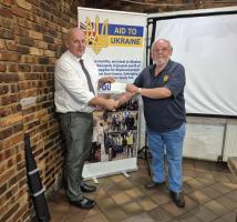 Gary Fear cheque presentation for Ukraine